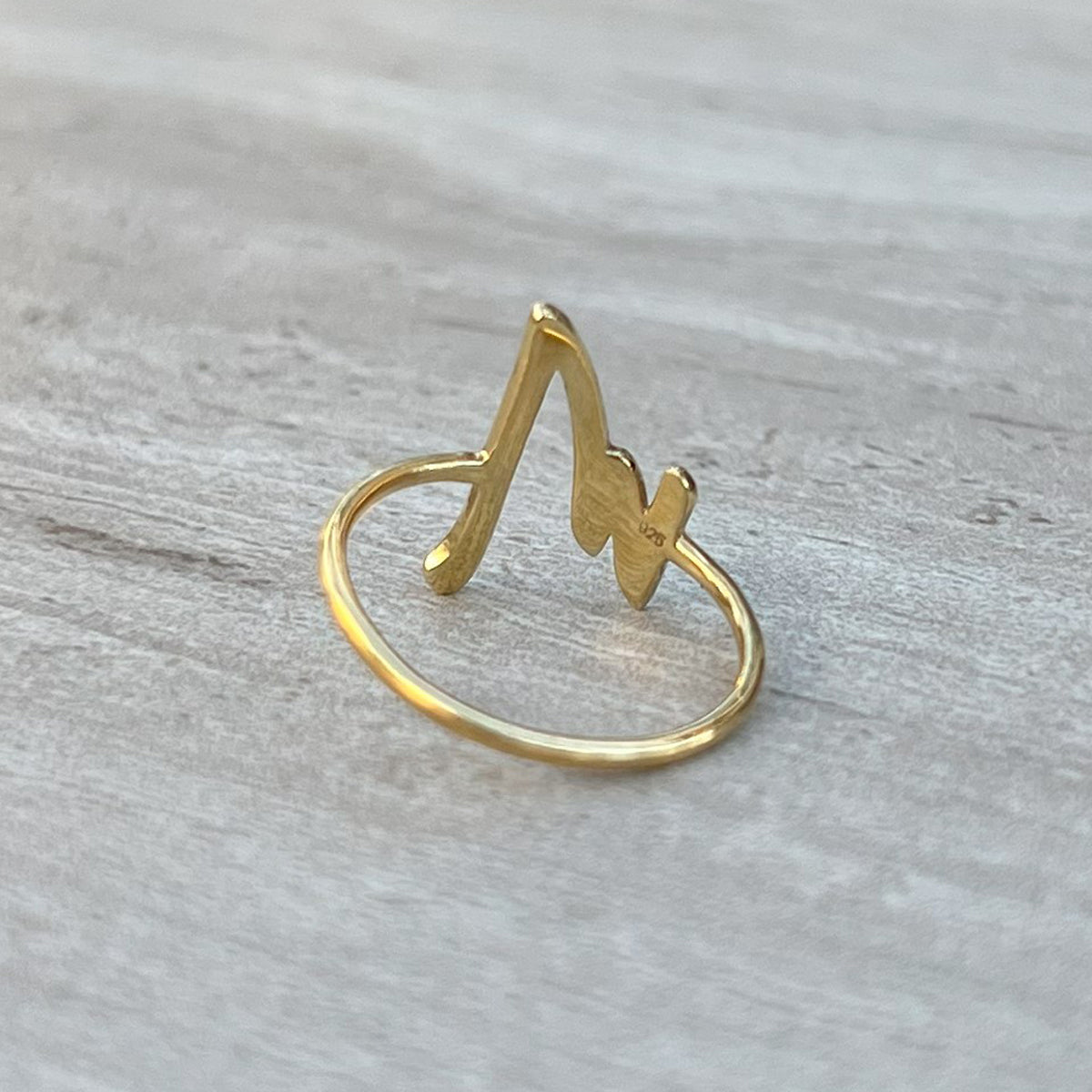 M letter motif gold ring back