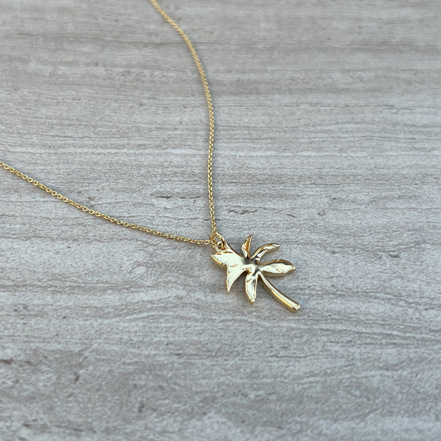 gold necklace palm tree pendant