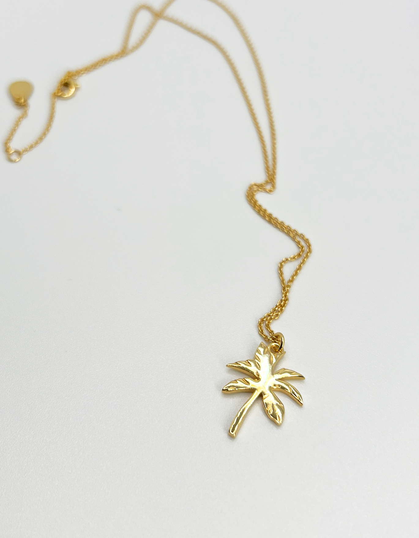 gold necklace palm tree pendant