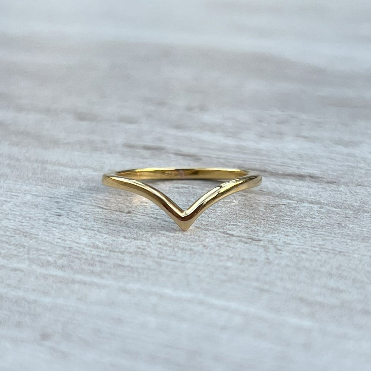 gold V-shaped stackable ring front